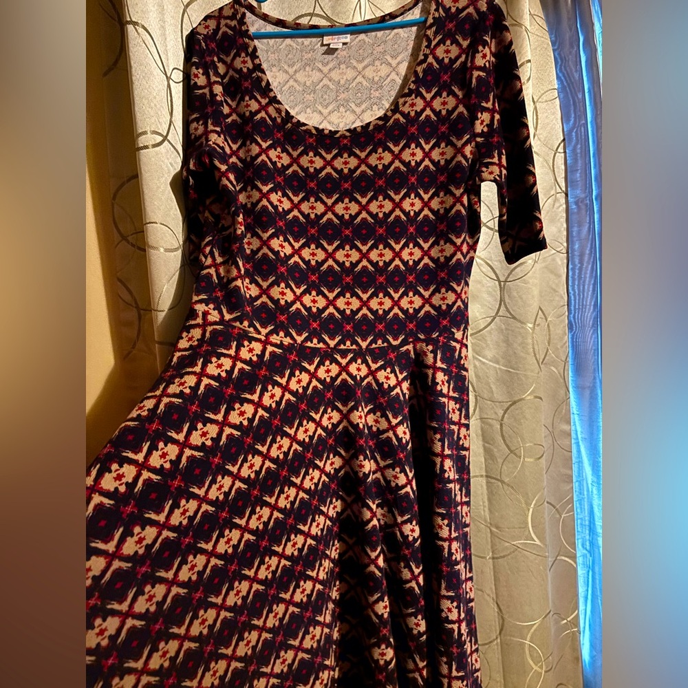 LuLaRoe NICOLE dress in excellent condition. No snags or tears.